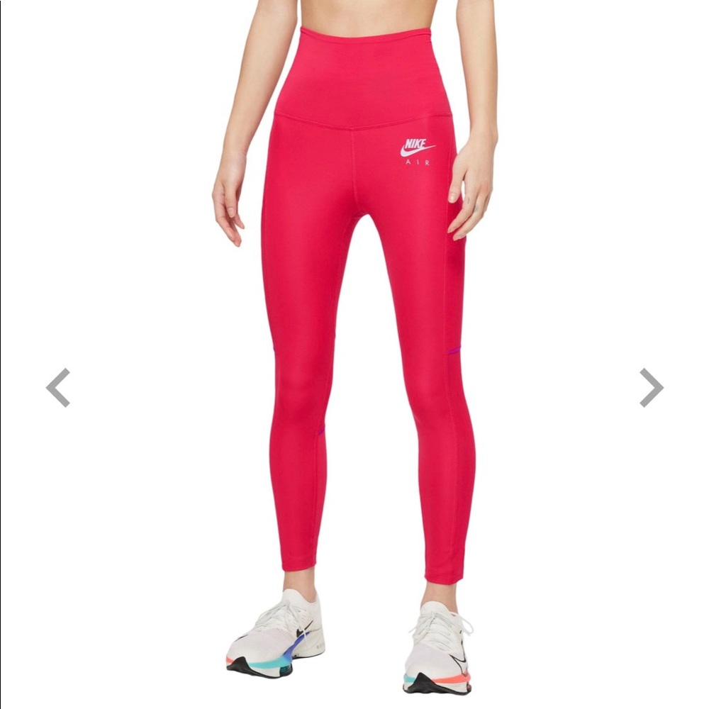 Cute, bright pink Nike leggings. Size XS. Mesh on back of the leg, gently used.